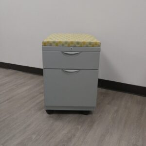 Teknion, silver mobile pedestal w/ cushion. 23"H x 22"D x 15"W