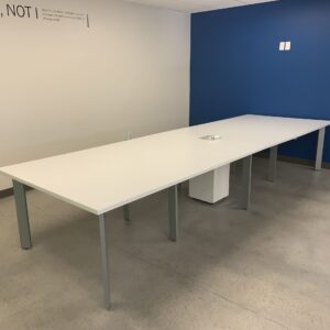 Haworth Planes, White Conference table 14'Lx54"Dx30"H with power module.