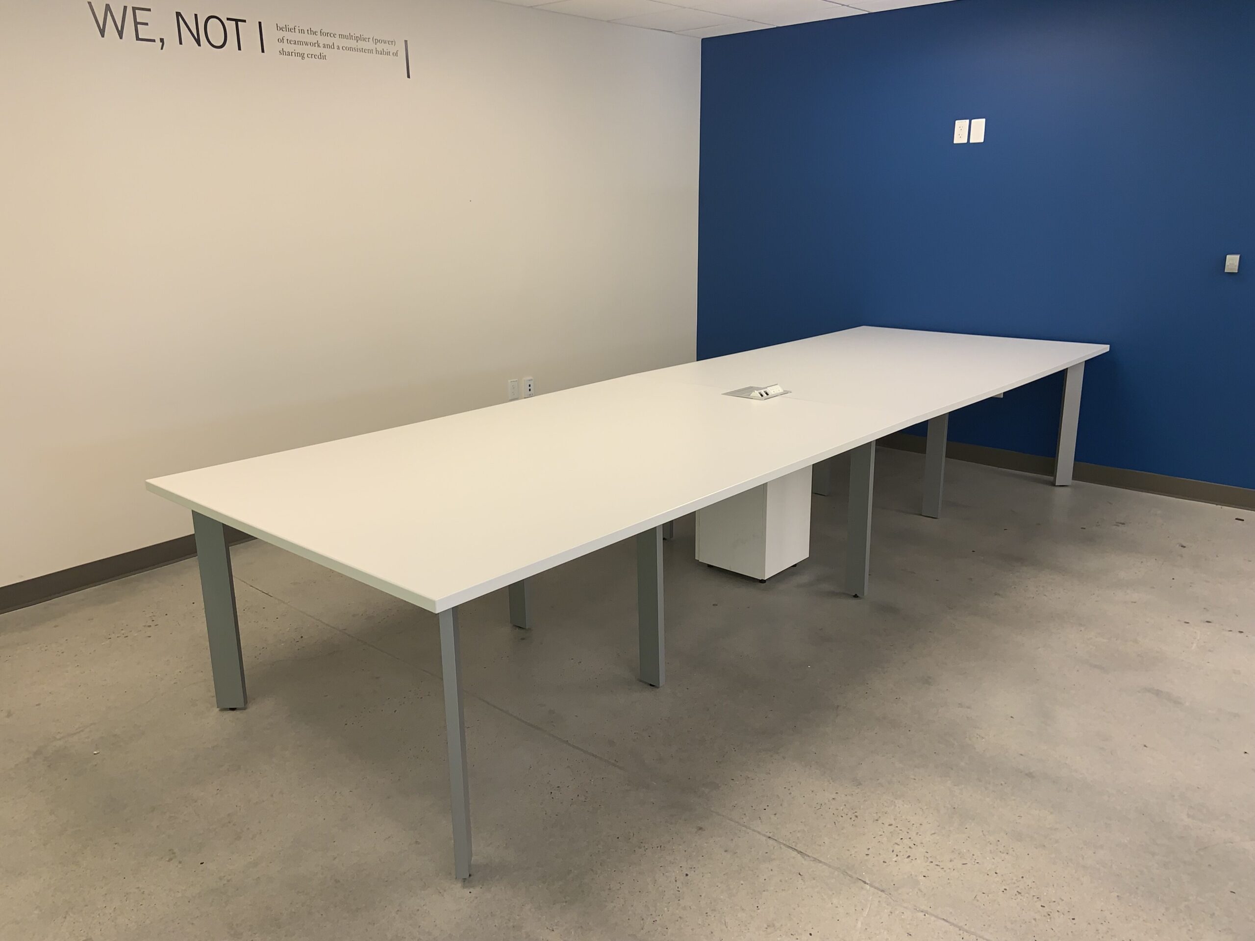 Haworth Planes, White Conference table 14'Lx54"Dx30"H with power module.