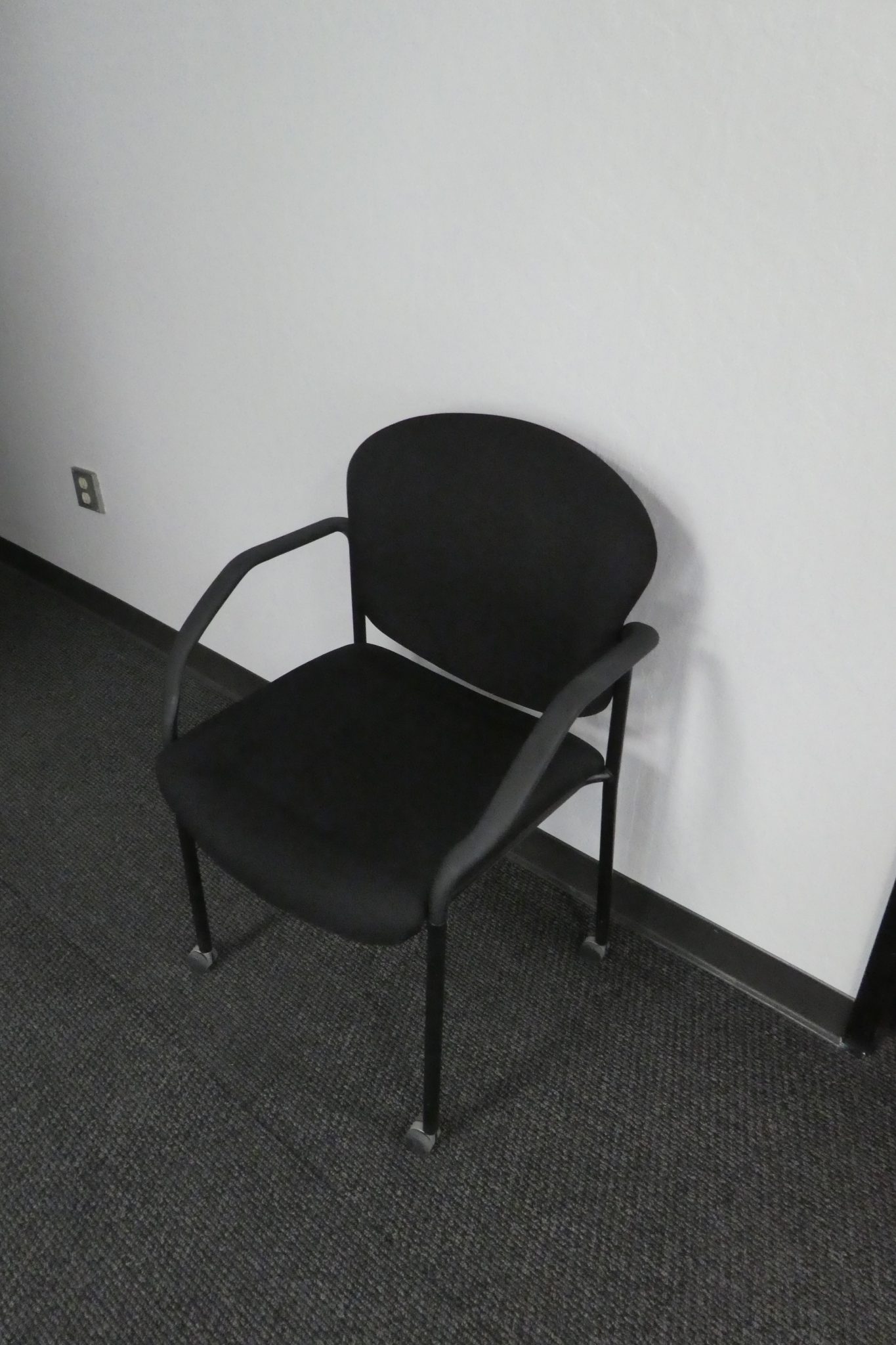 OMF. Inc Black Guest Chair with Casters