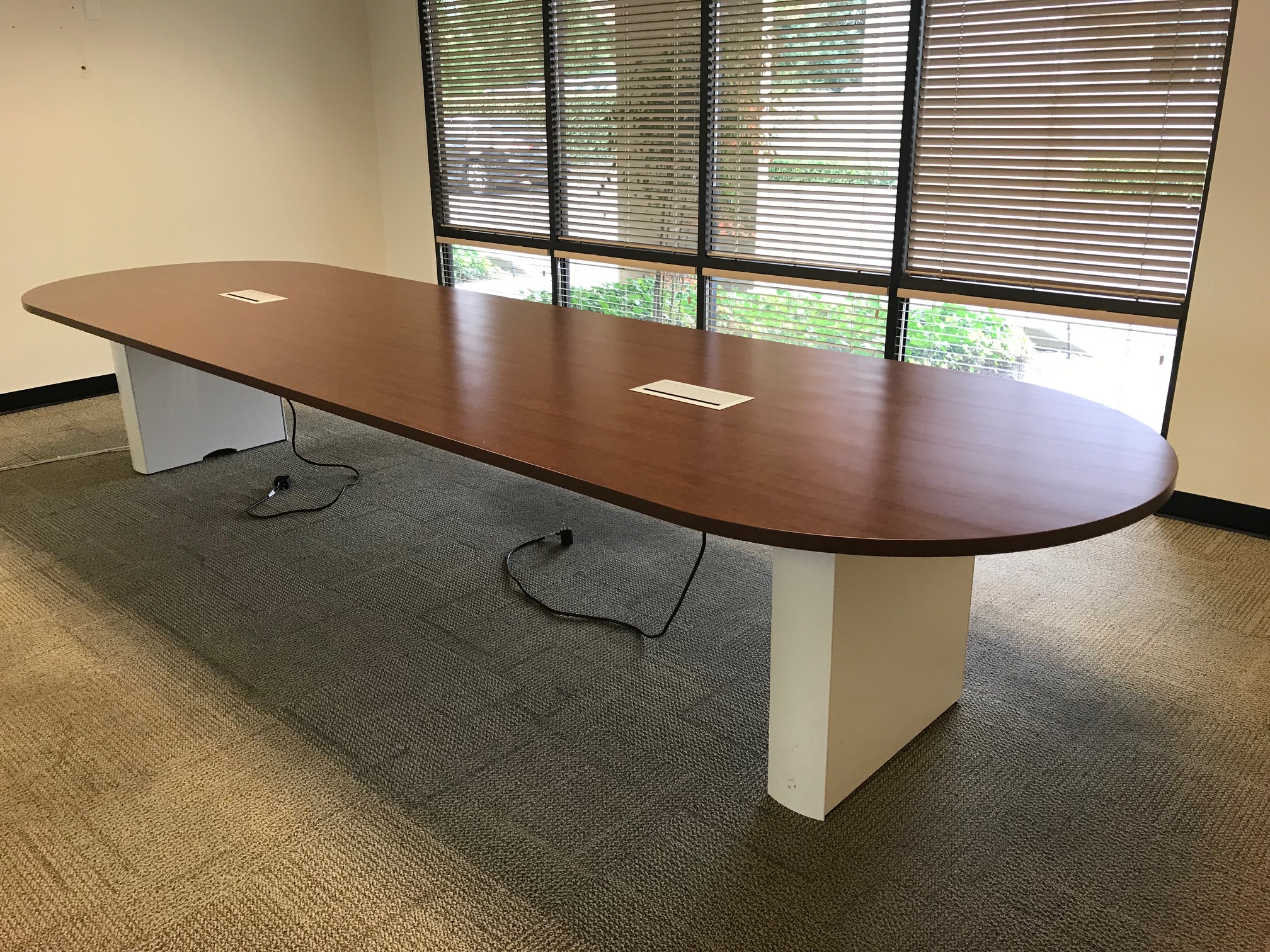 HON, Espresso Laminate Conference table with power module and white supporting base