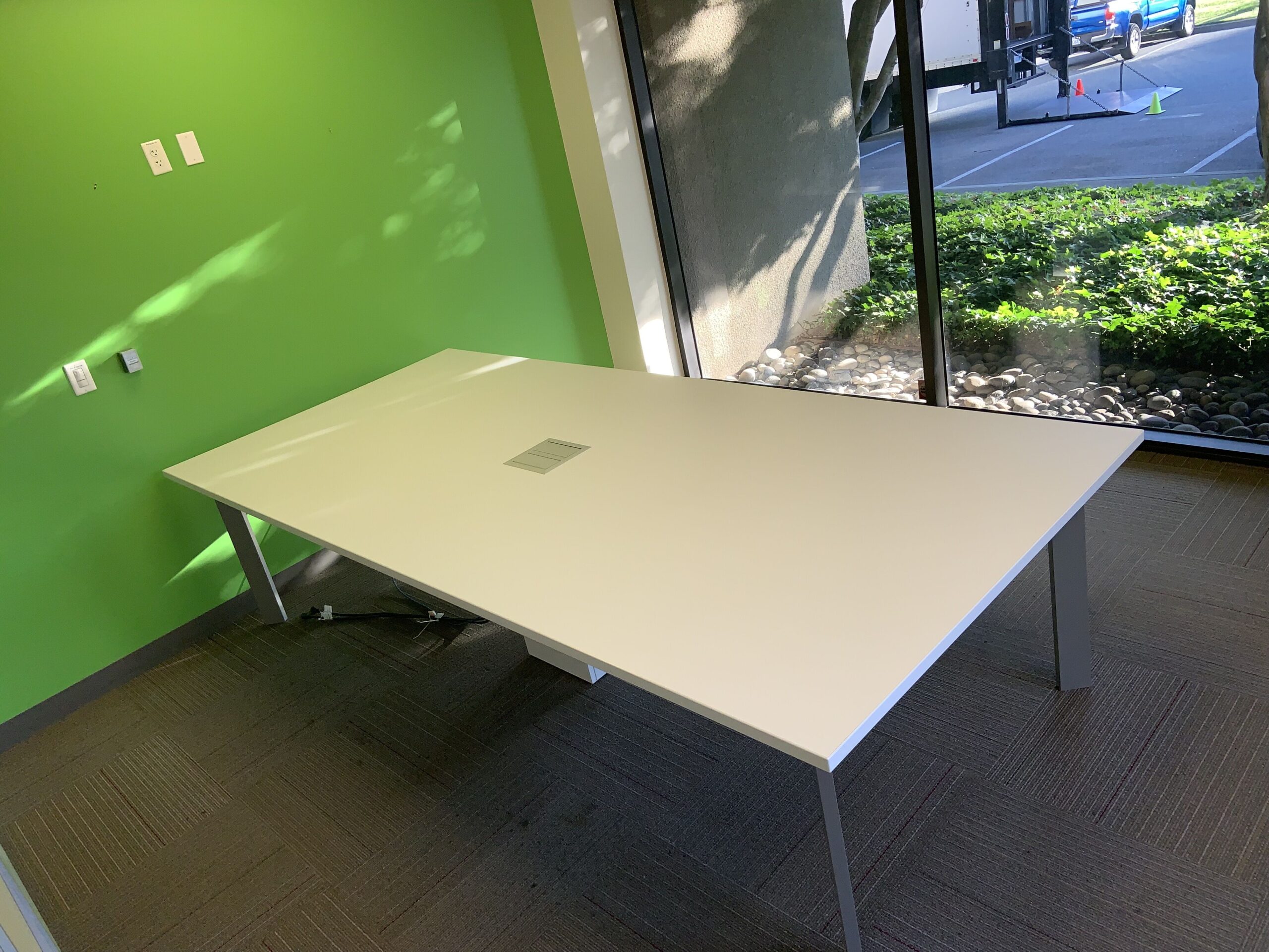 Haworth Planes, White Conference table 10'Lx54"Dx30"H with power module.